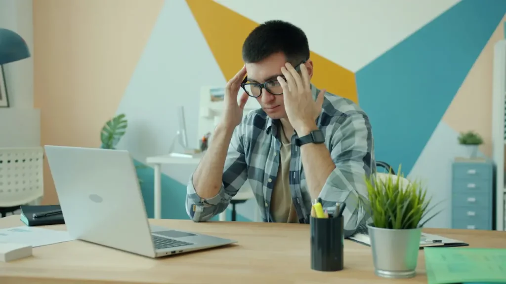 Busy Lifestyle - man stressed at work